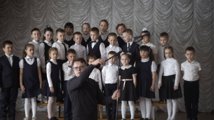 Pasha With Children Choir credit Pasha Talankin